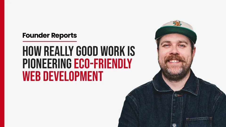 Drew Minns featured in Founder Reports, with the headline ‘How Really Good Work is Pioneering Eco-Friendly Web Development.’ Drew is smiling, wearing a denim jacket and a cap with a tiger logo, set against a clean, white background with red accents.